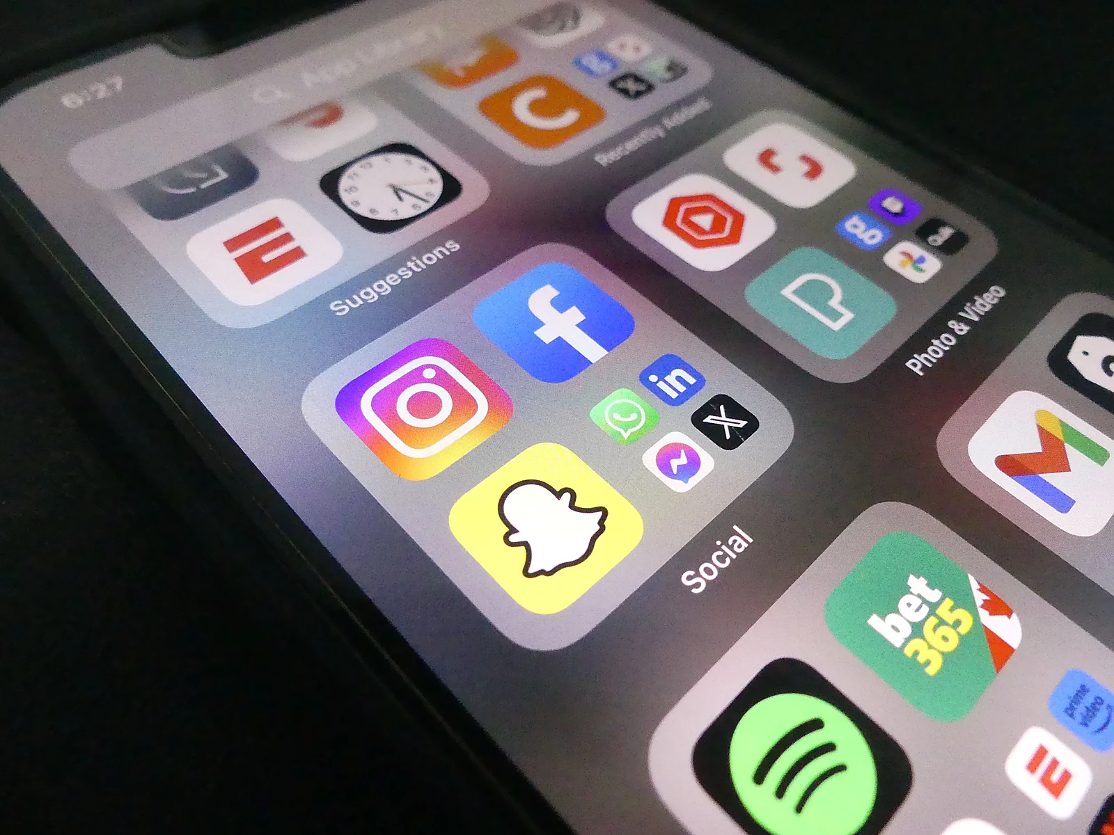 Smartphone displaying social media applications
